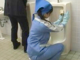 Japanese Bitch Sucks Dick in a Toilet Stall